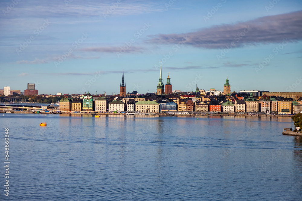 Scenic panoramic view of Gamla Stan in Old Town Stockholm with blue sky, morning capital of Sweden. Background of amazing urban scenery view of Scandinavian architecture. Copy text space