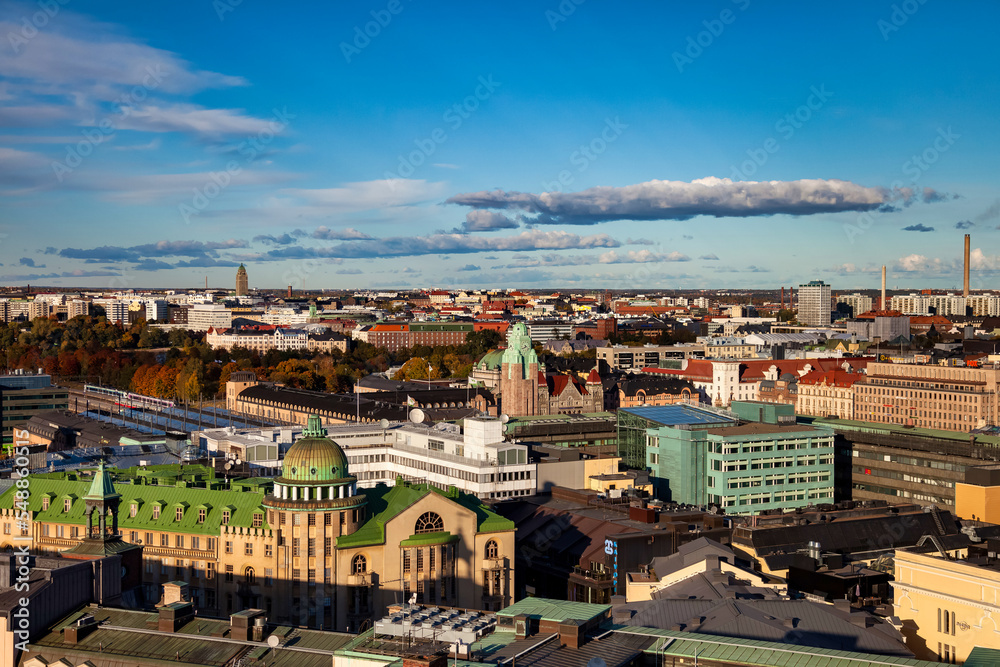 Aerial scenic panoramic view city of Helsinki, capital of Finland with buildings at blue evening sky. Background of amazing urban scenery view of Scandinavian finnish architecture. Copy text space