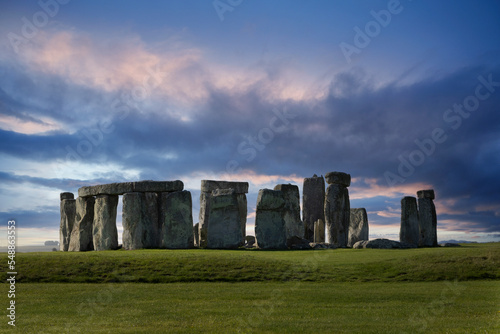 the stones of stonehenge with a moody sky photo