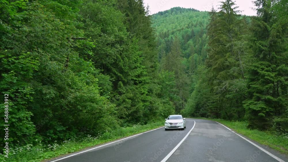 Road through mountains forest first-person view Road through mountains forest first-person view