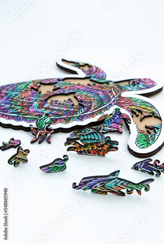 Wooden puzzle for children and adults. puzzles made of wood in the form of animal figures
