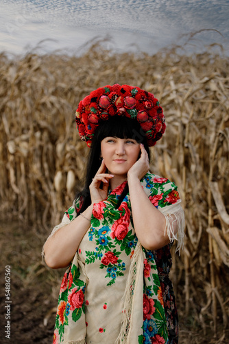 Ukrainian girl in a red wreath