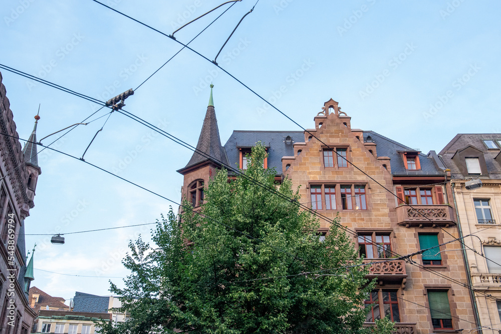 Houses of towns of France with tram in the city