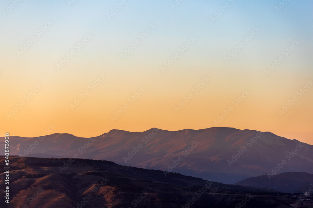 picturesque red mountains at sunset