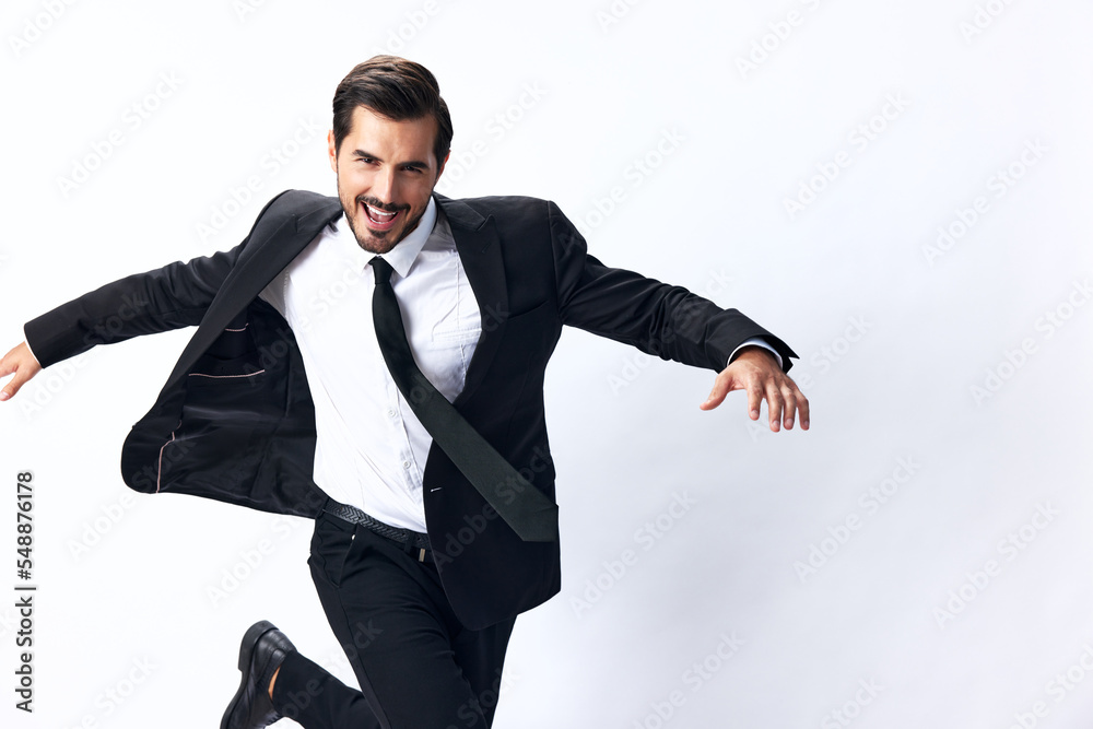 Man business jumps in business suit and serious face on white isolated background running. Startup businessman concept the way to the money Man business jumps in business suit and serious face on white isolated background running. Startup businessman concept the way to the money