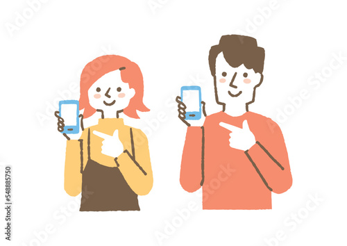 スマホを指差す男女二人_色
