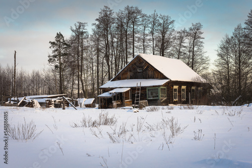 house in the snow © Evgenii Ryzhenkov