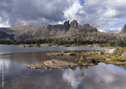 rocky shore at lake elysia with mt geryon in the background at the labyrinth in cradle mountain-lake st clair national park of tasmania photo