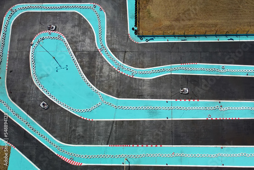 Aerial drone view of carting race track. Karting racetrack view above. Speedway kart field. photo