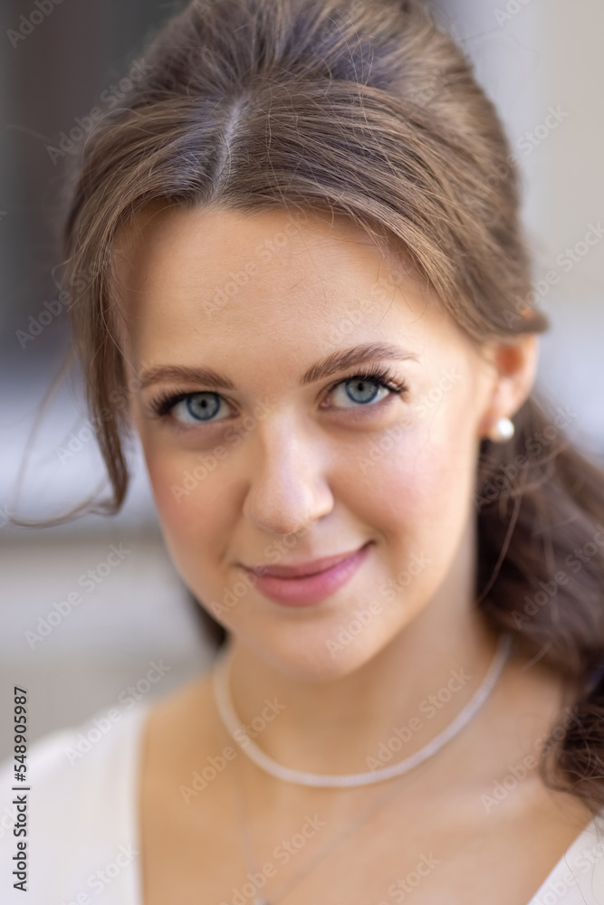Beautiful elegant bride in a simple white wedding dress, wedding dress-combination Beautiful elegant bride in a simple white wedding dress, wedding dress-combination