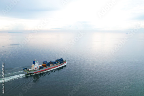 International trade concept .Aerial view of container shipping business Import-Export Logistics Shipping ships are heading to ports, transported by large cargo ships.