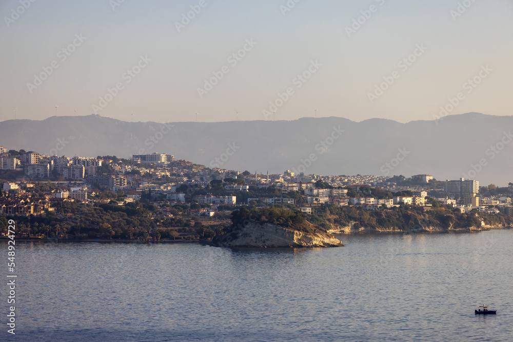 Homes and Buildings in a Touristic Town by the Aegean Sea. Kusadasi, Turkey. Sunny Evening. Homes and Buildings in a Touristic Town by the Aegean Sea. Kusadasi, Turkey. Sunny Evening.