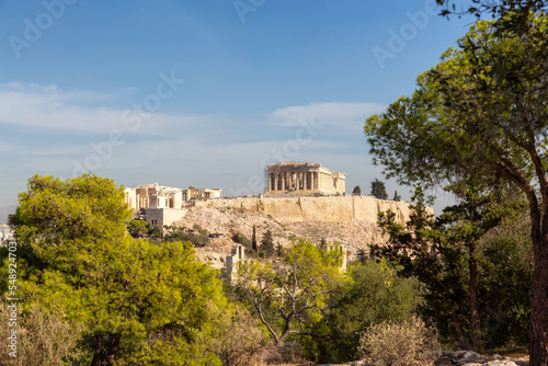 Historic Landmark, Odeon of Herodes Atticus, in the Acropolis of Athens, Greece. Sunny Day viewed from Philopappos Hill.
