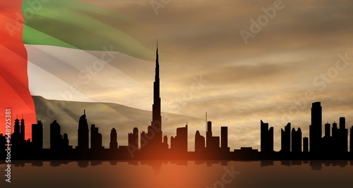 United Arab Emirates flag and Dubai skyline view at sunset. UAE celebration. National day  Flag day  Commemoration day  Martyrs day.
