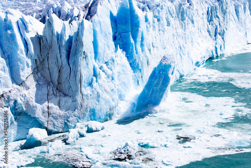 Photography Massive glacial ice calving.