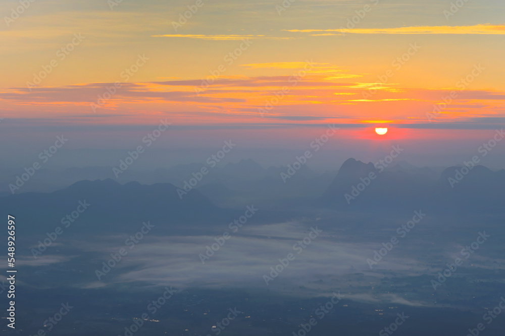 Beautiful sunrise view from Nok Ann cliff, Phu Kradueng National Park, Thailand