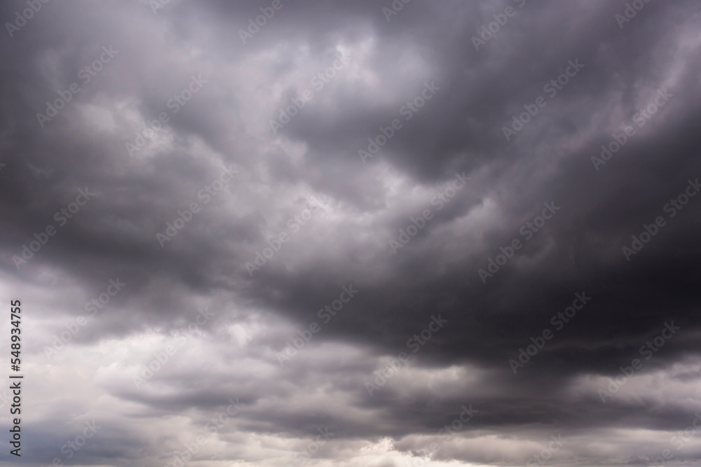 Dark clouds all over the sky before a heavy rain storm Dark clouds all over the sky before a heavy rain storm