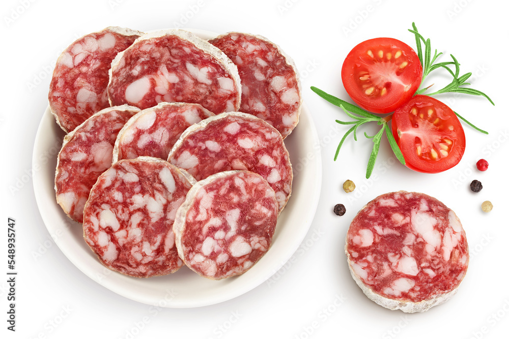 Cured salami sausage in ceramic bowl isolated on white background. Italian cuisine with full depth of field. Top view. Flat lay. Cured salami sausage in ceramic bowl isolated on white background. Italian cuisine with full depth of field. Top view. Flat lay.