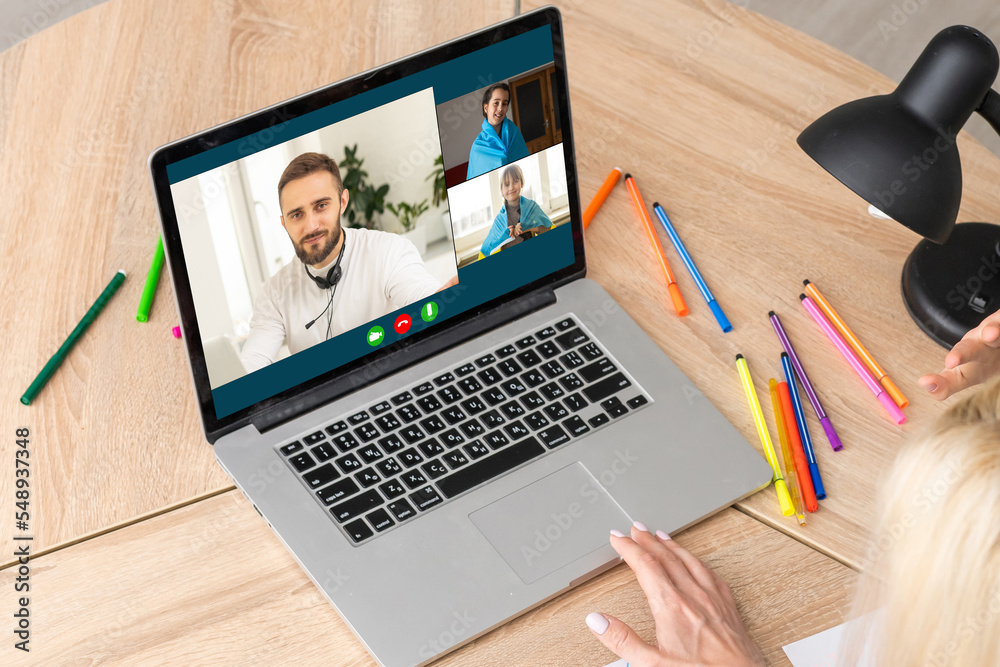 Fototapeta premium video conference. Multiethnic business team using laptop for a online meeting in video call. Group of people smart working from home