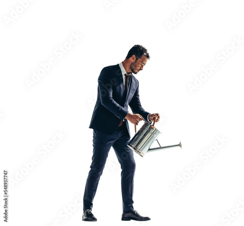 Corporate businessman pouring water out of a water can on a transparent background photo