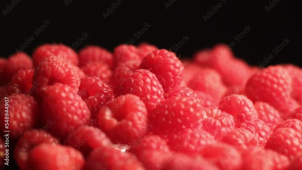 Fresh Red Raspberries on Spinning Plate, Close Up Studio Shot Fresh Red Raspberries on Spinning Plate, Close Up Studio Shot