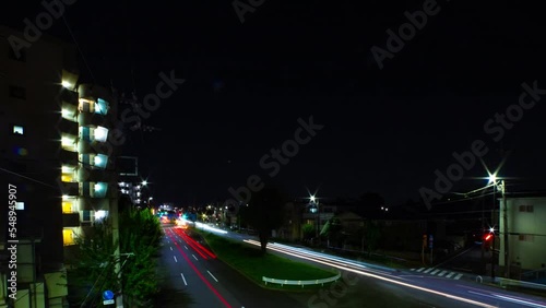 A night timelapse of the traffic jam at the downtown street in Tokyo wide shot photo