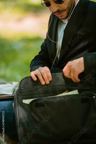 Close up of a businessman with his bag