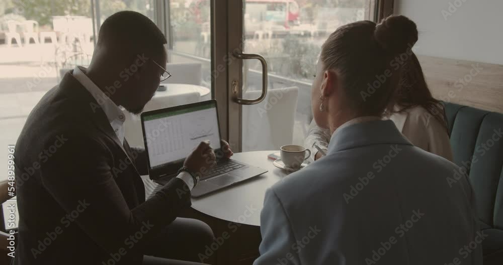 International, multiracial colleagues working together, zoom in International, multiracial colleagues working together, zoom in