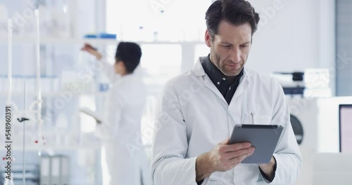 Wallpaper Mural Scientist with tablet, science and research in laboratory, man with technology and data analysis, health with chemistry or physics. Scientific knowledge, doctor in lab with digital information. Torontodigital.ca