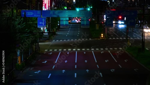 A night timelapse of the traffic jam at the downtown street in Tokyo tilt photo