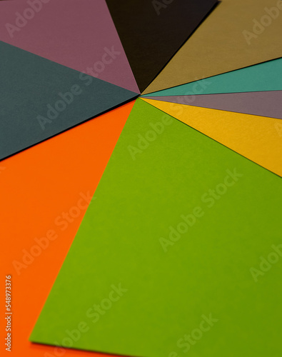 Different colored sheets of paper lying on top of each other