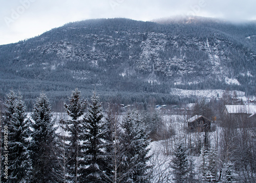 Mountain landscape behind a frozen river in Norway