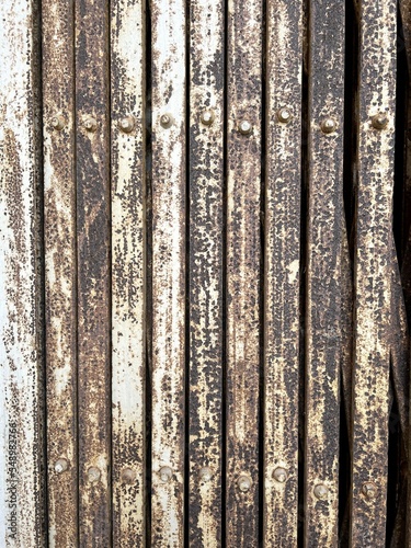 old rusty metal fence with rust background