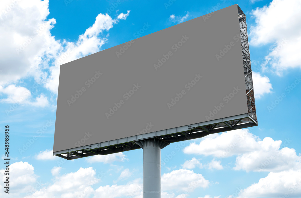 Outdoor billboard on blue sky background with clipping path Outdoor billboard on blue sky background with clipping path