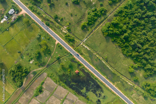 Aerial view of long roads leading through beautiful landscapes in chundakadu forest, kantale, Sri Lanka