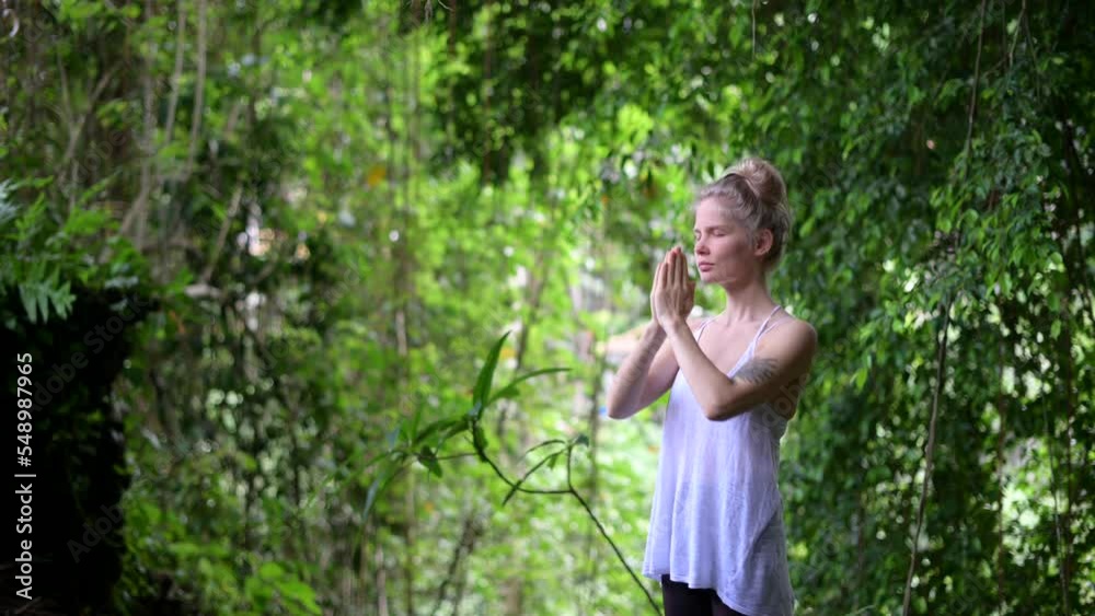 Girl practice yoga meditation outdoor in park Girl practice yoga meditation outdoor in park