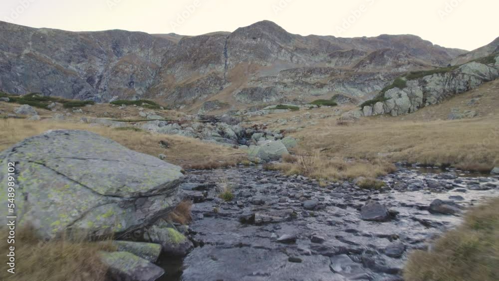 Shallow mountain stream in Rila mountain, Bulgaria Shallow mountain stream in Rila mountain, Bulgaria