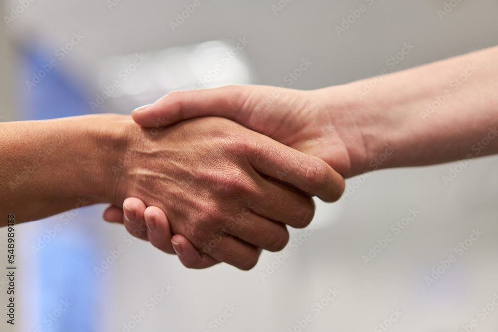 Business people at the handshake for deal and cooperation Business people at the handshake for deal and cooperation