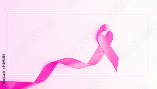 Cancer ribbon. Health care symbol pink ribbon on white background. Breast cancer woman support concept. World cancer day.