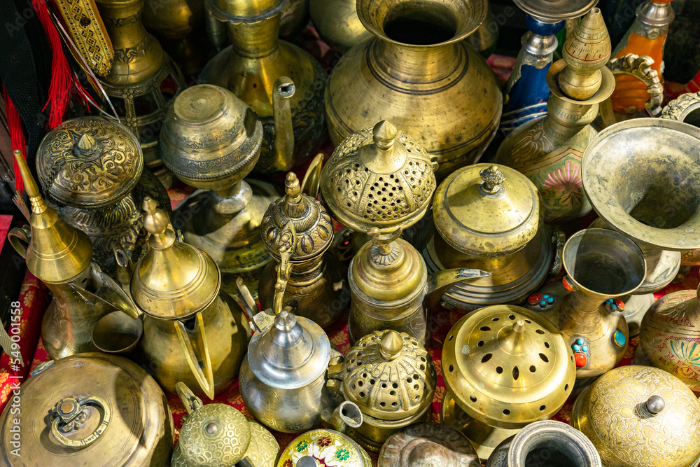 Souvenirs exhibited in market shops of the old town Nizwa. Oman. Arabian Peninsula. Souvenirs exhibited in market shops of the old town Nizwa. Oman. Arabian Peninsula.