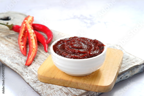  gochujang -korean red chili paste, spicy and sweet fermented condiment in Korean food photo