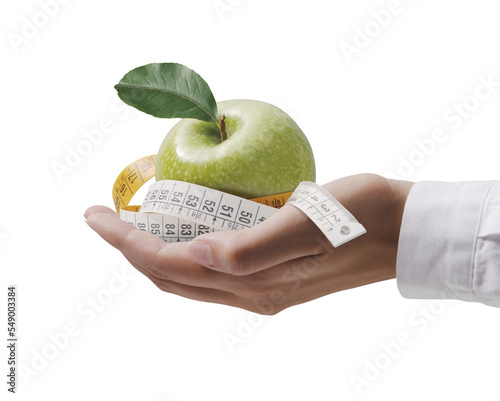 PNG file no background Nutritionist holding a tape measure and an apple