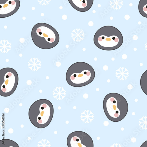 Seamless pattern of penguin faces, snowflakes and dots on a blue background. Kawaii style. Cartoon character design.