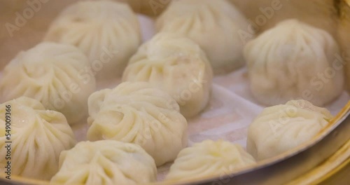 Close-up hot steamed buns in a steamer