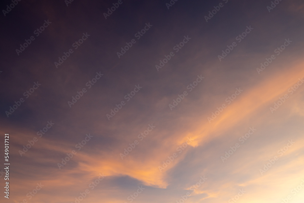 Sunset with clouds on the mountains.The sunset gives pass through the clouds late evening. Ray of the sunset with sky background. Beautiful sun beam pass through the cloud. Beautiful sky. Sunset with clouds on the mountains.The sunset gives pass through the clouds late evening. Ray of the sunset with sky background. Beautiful sun beam pass through the cloud. Beautiful sky.