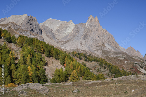  View of the scenic Valee de la Claree in the French Alps with Massif de Cerces mountains on either side of the valley, near Briancon, France