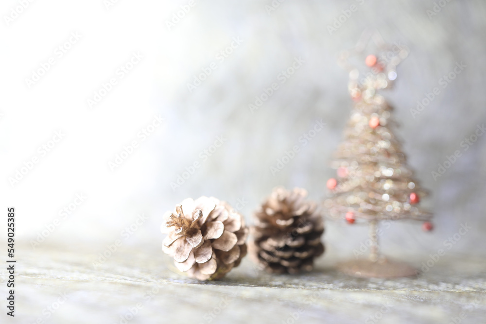 pine cone and mini golden Christmas tree