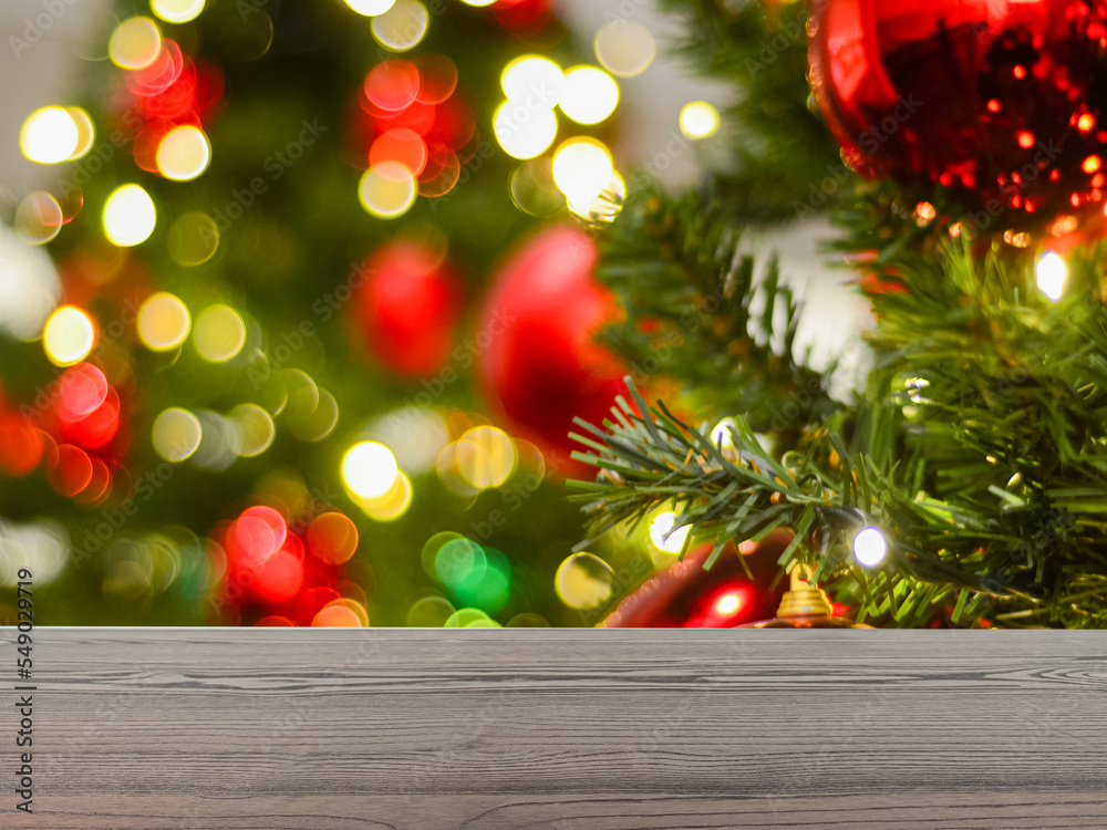 The empty table wooden board in front of the background is blurred. Brown wood perspective in christmas celebrations -can be used to display or montage your products. Mock ups for products The empty table wooden board in front of the background is blurred. Brown wood perspective in christmas celebrations -can be used to display or montage your products. Mock ups for products