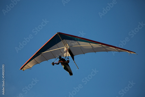 man flying in hang glider