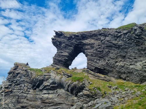 Landscape of a rock arch on the hill in Kirkeporten, Norway photo